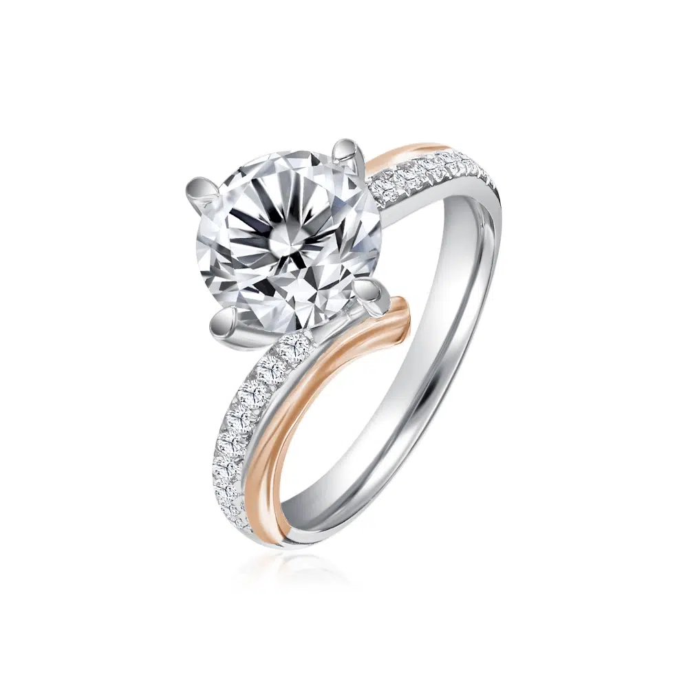 SK rose gold diamond ring with a twirl shaped pave band in 18k white gold and rose gold and 101 facets lab grown diamond viewed from the side