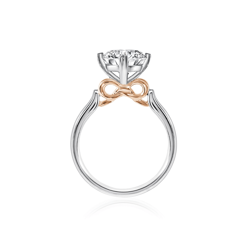 SK rose gold diamond ring in four clean heart shaped prongs made from white gold and rose gold material with 101 facets lab grown diamond viewed vertically